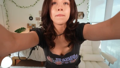 pokimane - Wearing a micro bikini and squatting with oil on the buttocks.