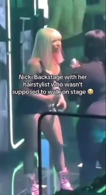 nickiminaj - More of me teasing myself in this pink rubber leotard I kind of